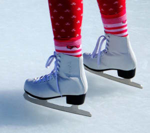 A pair of white skates